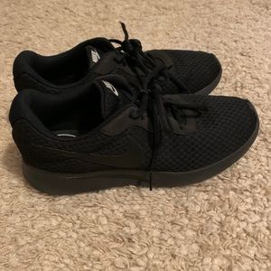 Women’s Black Nike Tanjun Running Sneaker